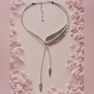 UNO De 50 Feather Lariat Necklace 
16” long with 3” inch extender